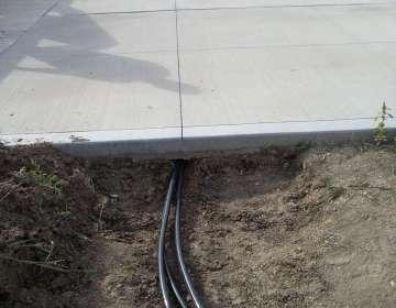 Horizontal Boring (Example: Placing irrigation lines under a 45 ft wide driveway)
